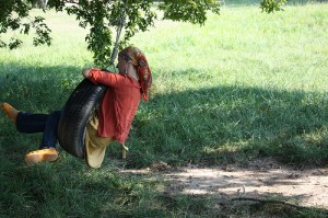 simple pleasure - swing on a tire swing simple pleasure - swing on a tire swing