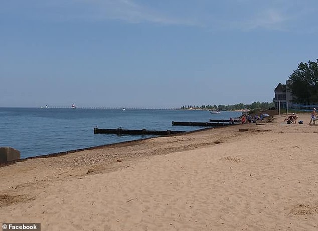 A 44-year-old man drowned at Lions Park Beach in St. Joseph, Michigan, pictured. The death came as the man tried to rescue his two children who became caught in an undertow on the lake (file photo)