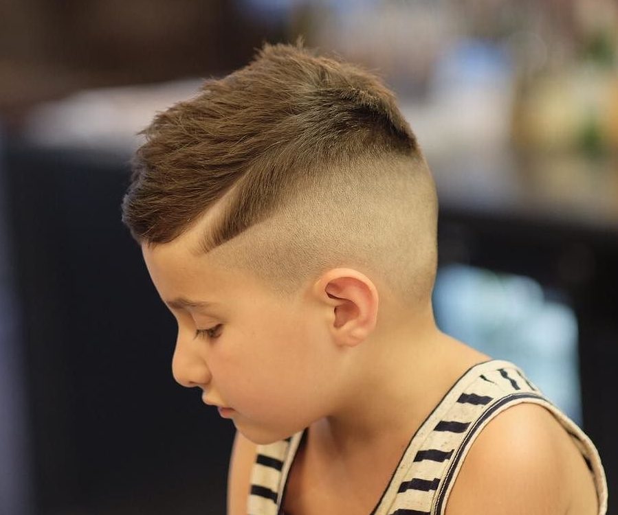 Textured haircut bald fade for boys
