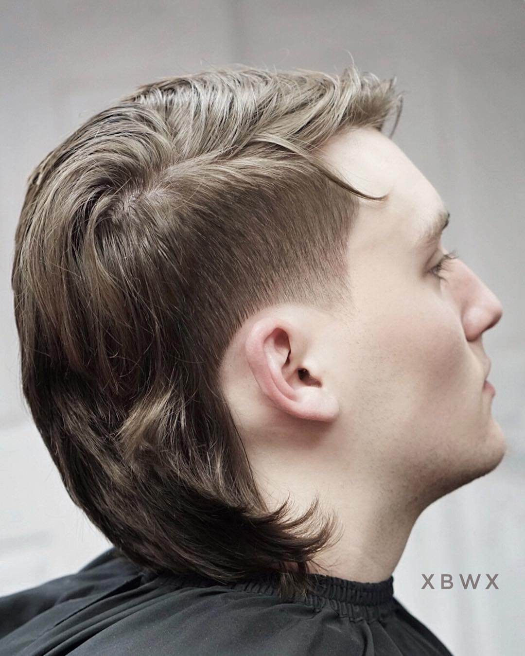 Modern side part mullet haircut